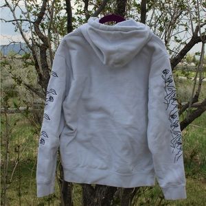 White hoodie from poet ATTICUS collection.